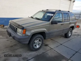 1996 Jeep Grand Cherokee Laredo с VIN 1J4GZ58S3TC245928, выставлен на аукционе Copart как лот 57313735 с пробегом 165 733 миль миль и Списание • Salvage title. История ставок и продаж доступна на DreamBid. Изображение 1.