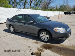 2013 Chevrolet Impala LT with VIN 2G1WB5E36D1174386, listed as a Copart auction lot 52981755 with 76,455 mi miles and Salvage Title. Bid and sale history available at DreamBid. Image 4.
