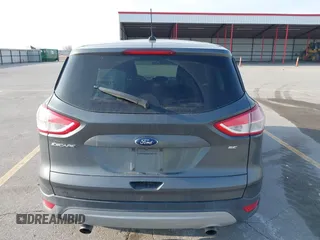 2015 Ford Escape SE with VIN 1FMCU0G73FUA77673, listed as a IAAI auction lot 41988290 with 176,734 mi miles. Bid and sale history available at carsss.com. Image 16.