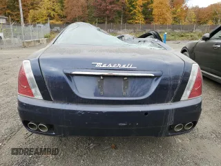 2006 Maserati Quattroporte z VIN ZAMCE39A460025290, wystawiony jako Copart lot #78816054 z przebiegiem Nie podano mil oraz Szkoda całkowita • Salvage title. Historia ofert i sprzedaży dostępna na DreamBid. Obrazek 6.