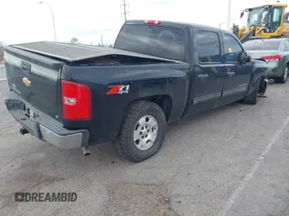 2013 Chevrolet Silverado 1500 LT with VIN 3GCPKSE72DG294500, listed as a IAAI auction lot 41619152 with 125,648 mi miles. Bid and sale history available at carsss.com. Image 4.
