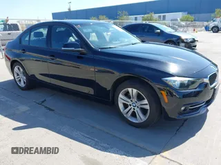 2016 BMW 3 Series 328i with VIN WBA8E9G51GNU28292, listed as a IAAI auction lot 42076233 with 43,758 mi miles. Bid and sale history available at carsss.com. Image 1.