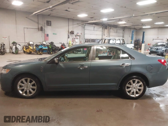 2012 Lincoln MKZ z VIN 3LNHL2GC1CR837698, wystawiony jako IAAI lot #41877061 z przebiegiem 129 411 mil mil oraz . Historia ofert i sprzedaży dostępna na DreamBid. Obrazek 14.