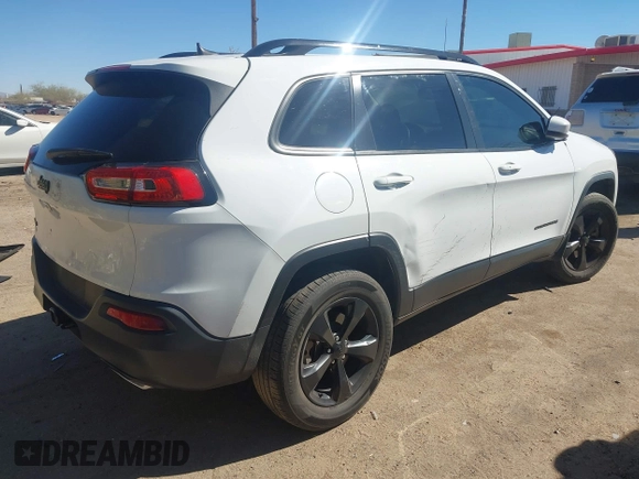 2016 Jeep Cherokee Latitude with VIN 1C4PJMCS9GW134769, listed as a IAAI auction lot 41668793 with 122,539 mi miles and . Bid and sale history available at carsss.com. Image 4.