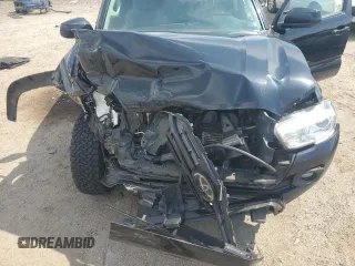 2019 Toyota Tacoma SR z VIN 3TMCZ5AN9KM283203, wystawiony jako Copart lot #55325915 z przebiegiem 116 318 mil mil oraz Szkoda całkowita • Salvage title. Historia ofert i sprzedaży dostępna na DreamBid. Obrazek 11.