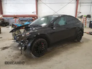 2021 Tesla Model Y Long Range with VIN 5YJYGDEE8MF252824, listed as a Copart auction lot 53801315 with 31,084 mi miles and Salvage Title. Bid and sale history available at DreamBid. Image 1.