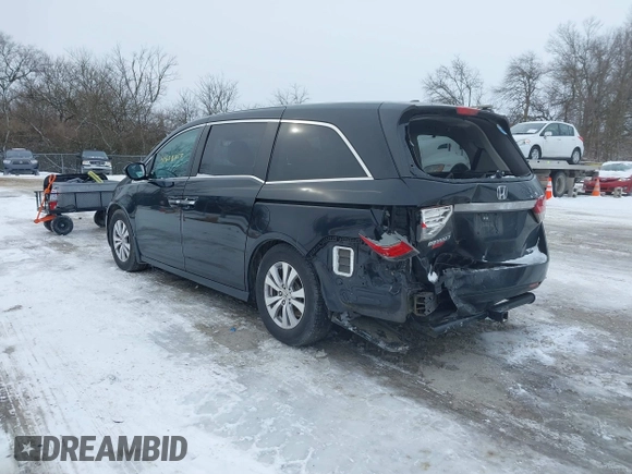 2015 Honda Odyssey EX-L with VIN 5FNRL5H60FB018030, listed as a IAAI auction lot 41608357 with 166,214 mi miles and . Bid and sale history available at carsss.com. Image 3.