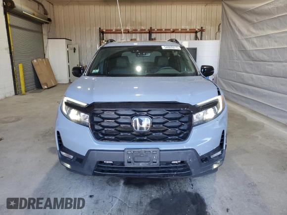 2023 Honda Passport Elite with VIN 5FNYF8H03PB034613, listed as a Copart auction lot 54009215 with 102,841 mi miles and Salvage title. Bid and sale history available at DreamBid. Image 5.