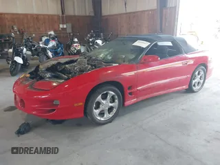 2000 Pontiac Firebird Trans Am with VIN 2G2FV32G7Y2121291, listed as a IAAI auction lot 40095437 with 140,293 mi miles. Bid and sale history available at carsss.com. Image 2.