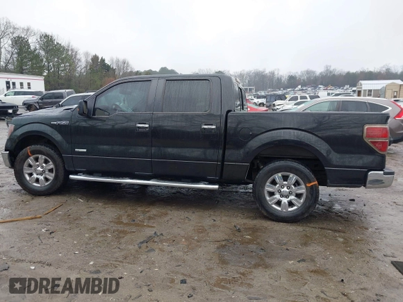2011 Ford F-150 XLT with VIN 1FTFW1CT5BFB13799, listed as a IAAI auction lot 41426609 with 200,000 mi miles. Bid and sale history available at carsss.com. Image 13.