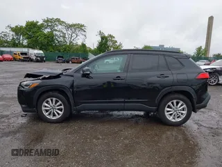 2022 Toyota Corolla Cross LE with VIN 7MUCAABG8NV004527, listed as a IAAI auction lot 42259519 with 15,211 mi miles and . Bid and sale history available at DreamBid. Image 13.