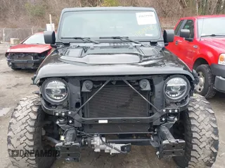 2021 Jeep Gladiator Rubicon z VIN 1C6JJTBG8ML524215, wystawiony jako IAAI lot #41829990 z przebiegiem 62 942 mil mil oraz . Historia ofert i sprzedaży dostępna na DreamBid. Obrazek 13.