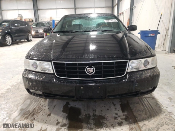 2002 Cadillac Seville Touring STS with VIN 1G6KY54962U158476, listed as a Copart auction lot 86624774 with 77,818 mi miles and Salvage Title. Bid and sale history available at carsss.com. Image 5.