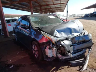 2018 Toyota Prius Two with VIN JTDKARFUXJ3062963, listed as a IAAI auction lot 41588989 with 114,842 mi miles. Bid and sale history available at carsss.com. Image 1.