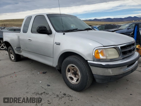 1998 Ford F-150 with VIN 2FTZX0729WCA50004, listed as a Copart auction lot 50028895 with 291,952 mi miles and Salvage title. Bid and sale history available at DreamBid. Image 4.