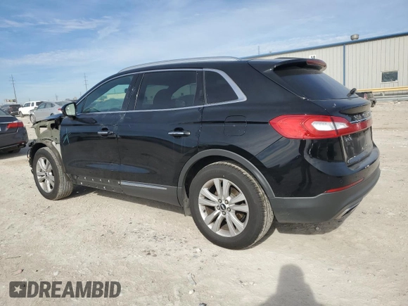 2016 Lincoln MKX Premiere with VIN 2LMTJ6JRXGBL66258, listed as a Copart auction lot 82767574 with 111,127 mi miles and Salvage Title. Bid and sale history available at carsss.com. Image 2.