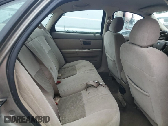 2004 Ford Taurus SE with VIN 1FAFP53274A193186, listed as a Copart auction lot 60255125 with 184,493 mi miles and Salvage title. Bid and sale history available at DreamBid. Image 10.
