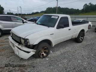 2003 Ford Ranger XL with VIN 1FTYR10U33TA45423, listed as a Copart auction lot 61186685 with 209,982 mi miles and Salvage title. Bid and sale history available at DreamBid. Image 1.