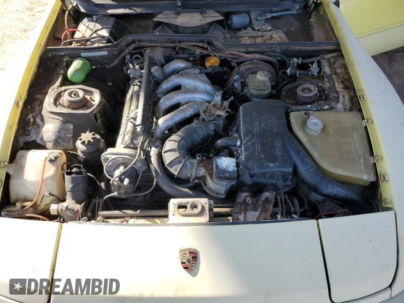 1983 Porsche 944 z VIN WP0AA0943DN459166, wystawiony jako Copart lot #75570024 z przebiegiem 82 020 mil mil oraz Czysty tytuł • Clean title. Historia ofert i sprzedaży dostępna na DreamBid. Obrazek 11.