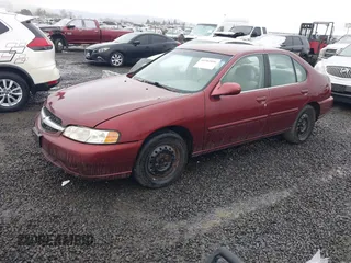 2000 Nissan Altima XE with VIN 1N4DL01D1YC189431, listed as a IAAI auction lot 41502056 with 215,958 mi miles. Bid and sale history available at carsss.com. Image 2.