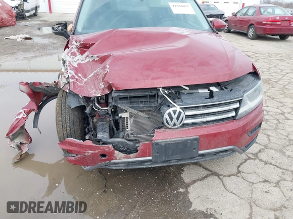 2018 Volkswagen Tiguan S with VIN 3VV1B7AX9JM085312, listed as a IAAI auction lot 41656827 with 122,322 mi miles and . Bid and sale history available at DreamBid. Image 6.