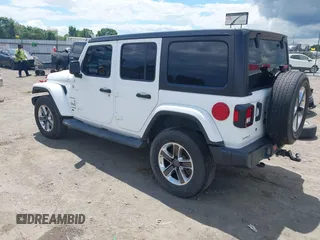 2019 Jeep Wrangler Unlimited Sahara with VIN 1C4HJXEN7KW535887, listed as a IAAI auction lot 42217440 with 91,226 mi miles and . Bid and sale history available at DreamBid. Image 3.