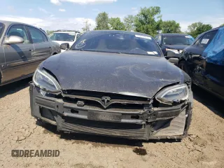 2016 Tesla Model S 90D with VIN 5YJSA1E42GF139758, listed as a Copart auction lot 63077255 with 78,235 mi miles and Salvage title. Bid and sale history available at DreamBid. Image 5.