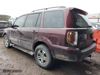 2007 Honda Pilot EX-L with VIN 2HKYF18767H538286, listed as a IAAI auction lot 41473762 with 239,429 mi miles. Bid and sale history available at carsss.com. Image 3.