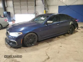 2018 BMW 5 Series M550i xDrive with VIN WBAJB9C56JB049488, listed as a Copart auction lot 58339605 with 56,106 mi miles and Salvage title. Bid and sale history available at DreamBid. Image 1.