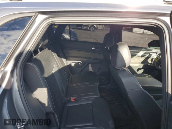 2023 Volkswagen Atlas SE с VIN 1V2HE2CA4PC207034, выставлен на аукционе Copart как лот 74105433 с пробегом 9 918 миль миль и . История ставок и продаж доступна на DreamBid. Изображение 11.