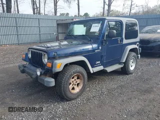 2005 Jeep Wrangler Sport z VIN 1J4FA49S25P302627, wystawiony jako IAAI lot #42100601 z przebiegiem 169 650 mil mil oraz . Historia ofert i sprzedaży dostępna na DreamBid. Obrazek 17.