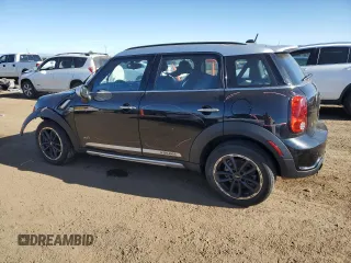 2016 MINI Countryman S with VIN WMWZC5C59GWU21416, listed as a Copart auction lot 57477455 with 119,868 mi miles and Salvage title. Bid and sale history available at DreamBid. Image 2.