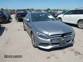 2015 Mercedes-Benz C 300 with VIN 55SWF4JB0FU056349, listed as a IAAI auction lot 41957561 with 74,764 mi miles and . Bid and sale history available at carsss.com. Image 1.