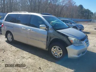 2005 Honda Odyssey EX-L with VIN 5FNRL38725B098992, listed as a IAAI auction lot 41639045 with 230,257 mi miles. Bid and sale history available at carsss.com. Image 1.
