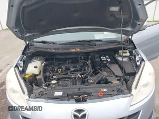 2012 Mazda 5 Touring with VIN JM1CW2CL7C0115096, listed as a IAAI auction lot 42524956 with 173,155 mi miles and . Bid and sale history available at DreamBid. Image 10.