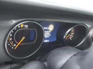 2023 Jeep Gladiator Overland z VIN 1C6HJTFG6PL544489, wystawiony jako IAAI lot #41311654 z przebiegiem 37 630 mil mil oraz . Historia ofert i sprzedaży dostępna na DreamBid. Obrazek 7.