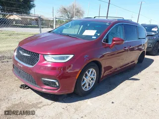 2021 Chrysler Pacifica Touring L with VIN 2C4RC1BG6MR601455, listed as a IAAI auction lot 41644243 with 95,966 mi miles. Bid and sale history available at carsss.com. Image 18.