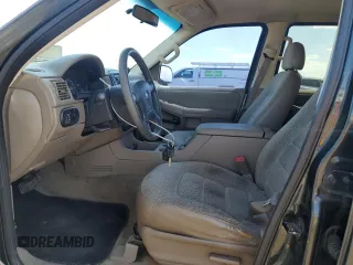 2003 Ford Explorer XLS с VIN 1FMZU72K43UB11906, выставлен на аукционе Copart как лот 61812065 с пробегом 190 672 миль миль и Списание • Salvage title. История ставок и продаж доступна на DreamBid. Изображение 7.