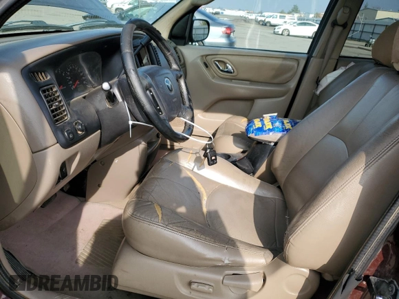 2002 Mazda Tribute LX with VIN 4F2CU08172KM34759, listed as a Copart auction lot 81631974 with 254,286 mi miles and Salvage Title. Bid and sale history available at carsss.com. Image 7.