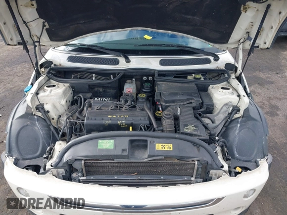 2006 MINI Convertible with VIN WMWRF33566TF65410, listed as a IAAI auction lot 40813052 with 131,109 mi miles and . Bid and sale history available at DreamBid. Image 10.