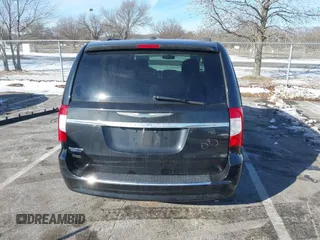 2016 Chrysler Town & Country Touring with VIN 2C4RC1BG7GR231704, listed as a IAAI auction lot 41306140 with 165,890 mi miles. Bid and sale history available at carsss.com. Image 16.