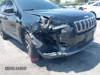2019 Jeep Cherokee Limited with VIN 1C4PJLDB3KD415866, listed as a IAAI auction lot 42358621 with 116,870 mi miles and . Bid and sale history available at DreamBid. Image 6.