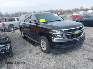 2019 Chevrolet Suburban LT with VIN 1GNSKHKC4KR405843, listed as a IAAI auction lot 41944385 with 123,071 mi miles and . Bid and sale history available at DreamBid. Image 1.