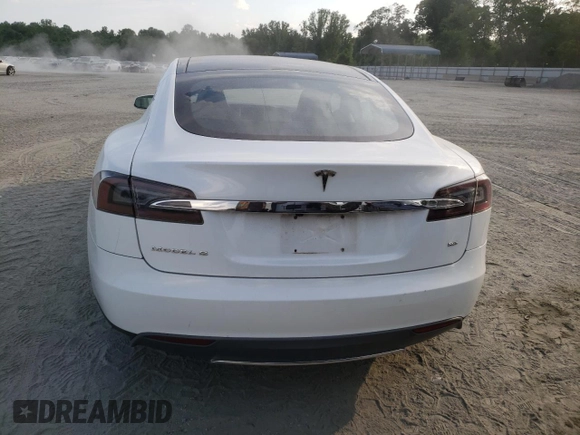 2014 Tesla Model S 60 с VIN 5YJSA1H18EFP33284, выставлен на аукционе Copart как лот 57434905 с пробегом 156 750 миль миль и Списание • Salvage title. История ставок и продаж доступна на DreamBid. Изображение 6.