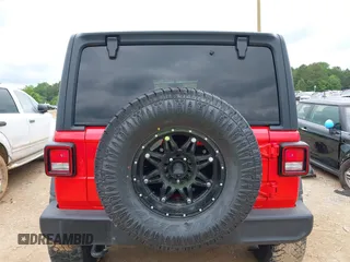 2020 Jeep Wrangler Unlimited Sport S z VIN 1C4HJXDN7LW281357, wystawiony jako IAAI lot #42363990 z przebiegiem 69 068 mil mil oraz . Historia ofert i sprzedaży dostępna na DreamBid. Obrazek 16.