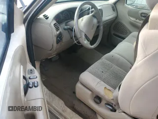 2003 Ford F-150 XL with VIN 1FTRX17LX3NA38576, listed as a Copart auction lot 54057495 with 173,811 mi miles and Salvage title. Bid and sale history available at DreamBid. Image 8.