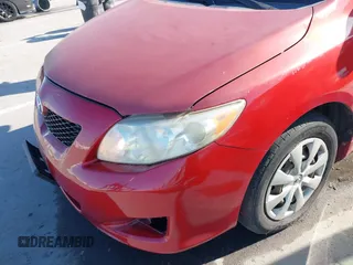 2009 Toyota Corolla with VIN JTDBL40E199074474, listed as a IAAI auction lot 41869413 with 264,873 mi miles. Bid and sale history available at carsss.com. Image 6.