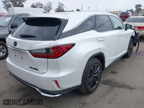 2022 Lexus RX 350L with VIN JTJHZKEA4N2023876, listed as a IAAI auction lot 42116084 with 8,841 mi miles and . Bid and sale history available at DreamBid. Image 4.