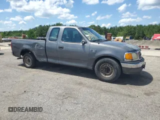 2004 Ford F-150 XL with VIN 2FTRX17W54CA32203, listed as a Copart auction lot 61666385 with Not provided miles and Salvage title. Bid and sale history available at DreamBid. Image 4.