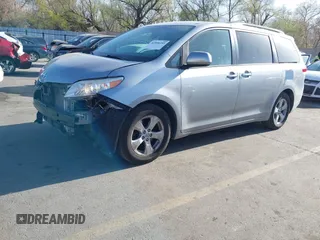 2013 Toyota Sienna LE AAS with VIN 5TDKK3DC6DS371126, listed as a IAAI auction lot 42006353 with 141,425 mi miles. Bid and sale history available at carsss.com. Image 2.